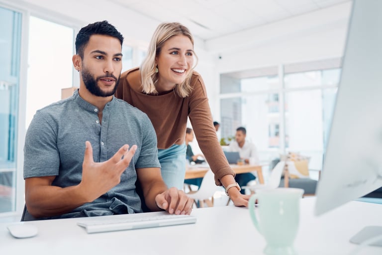 Team at computer for website ux planning and brainstorming